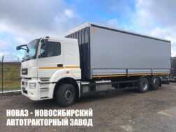 Тентованный грузовик КАМАЗ 65208‑1002‑87 грузоподъёмностью 14,8 тонны с кузовом 8200х2550х2700 мм