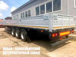 Бортовой полуприцеп МАЗ 975800‑2010 грузоподъёмностью 27,4 тонны с кузовом 13485х2460х700 мм