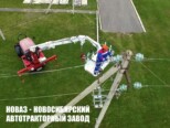 Многофункциональный трактор ДВИНА 3200.8 с манипулятором, буром и сертифицированной люлькой с доставкой по всей России (фото 3)