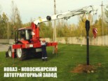 Многофункциональный трактор ДВИНА 3200.8 с манипулятором, буром и сертифицированной люлькой с доставкой по всей России (фото 4)