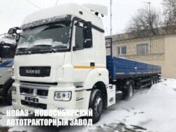 Автопоезд из седельного тягача КАМАЗ 5490-037-87 и бортового полуприцепа ТЗА 588513-0310210-07 с доставкой по всей России