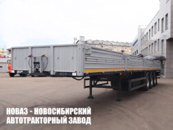 Бортовой полуприцеп МАЗ 975830‑2010 грузоподъёмностью 27,4 тонны с кузовом 13480х2476х730 мм